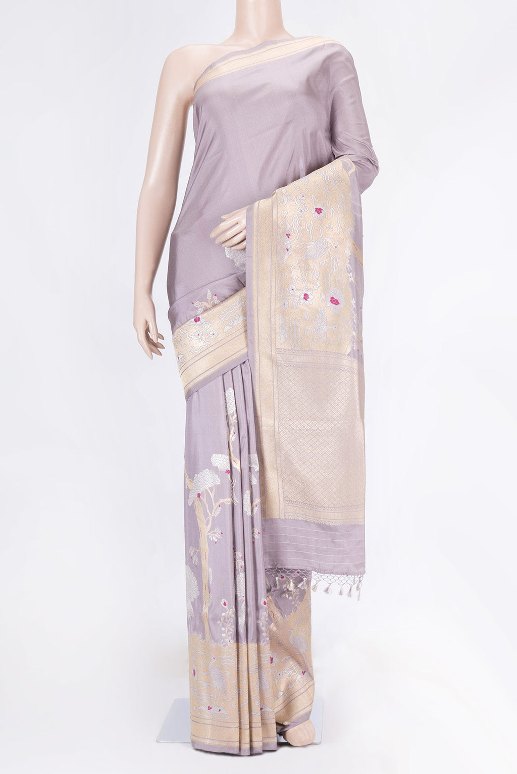 Lavender Dual Tone Banarasi Saree with Zari Butta on the body and Fancy Border displayed on a mannequin