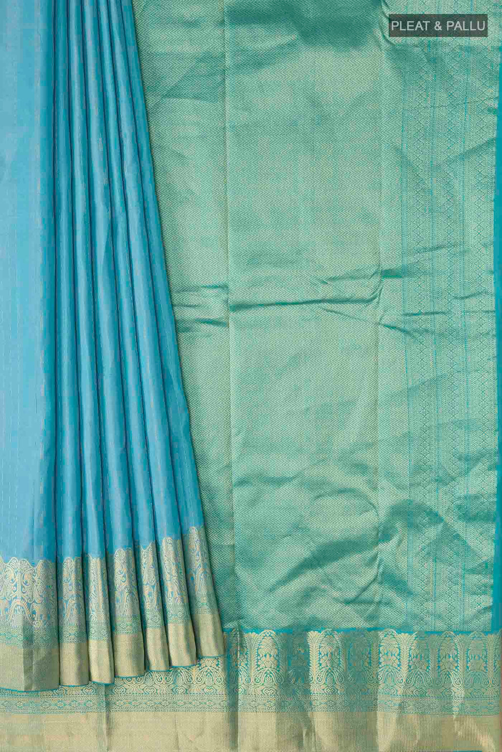 Pleats and pallu of Blue Kanchipuram Silk Saree with Zari Butta on the body and Zari Border