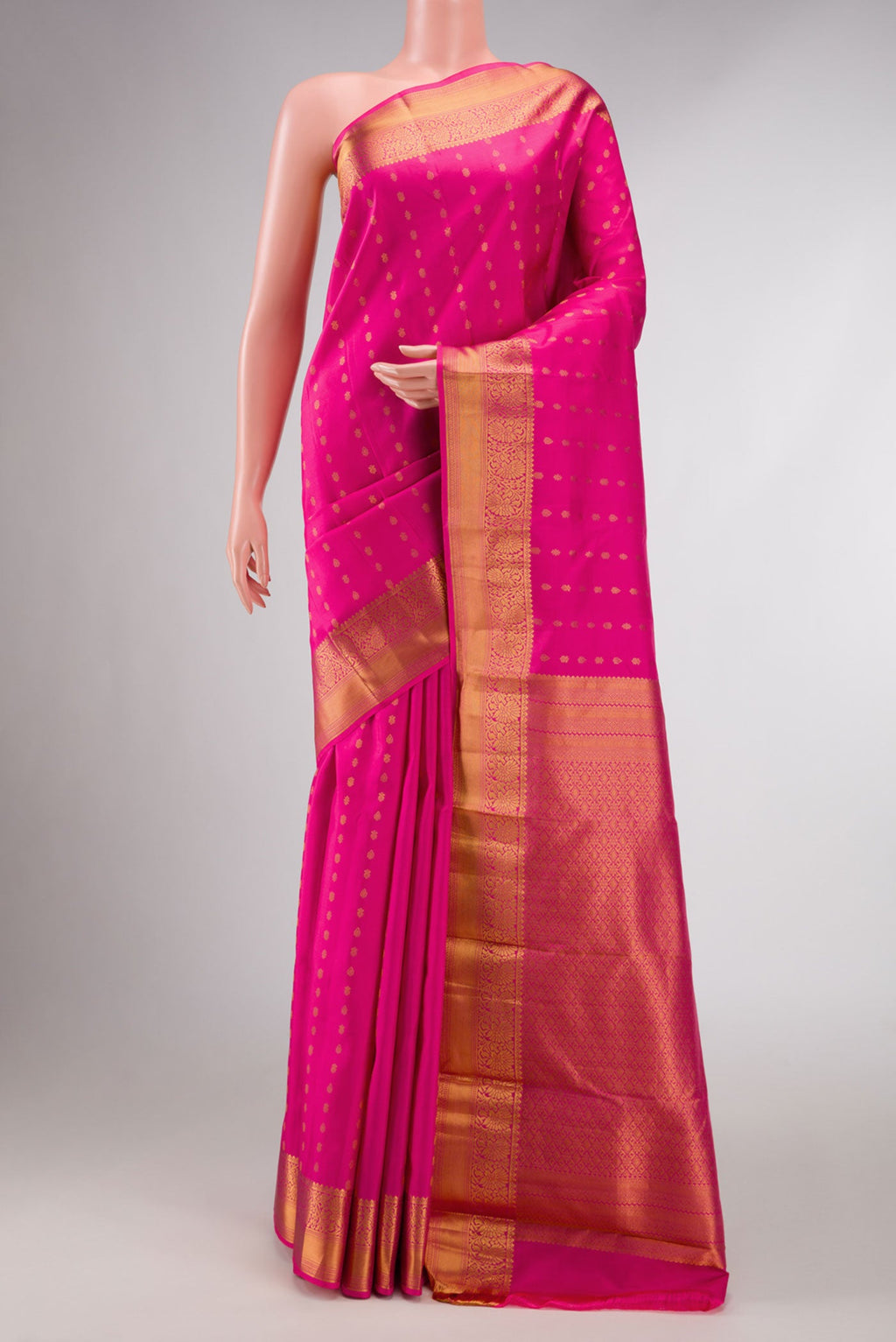 Pink Dual Tone Kanchipuram Silk Saree with Zari Butta on the body and Zari Border displayed on a mannequin