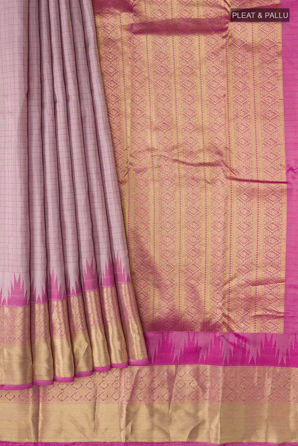 Pleats and pallu of Mauve Kanchipuram Silk Saree with Checked design on the body and Zari Border