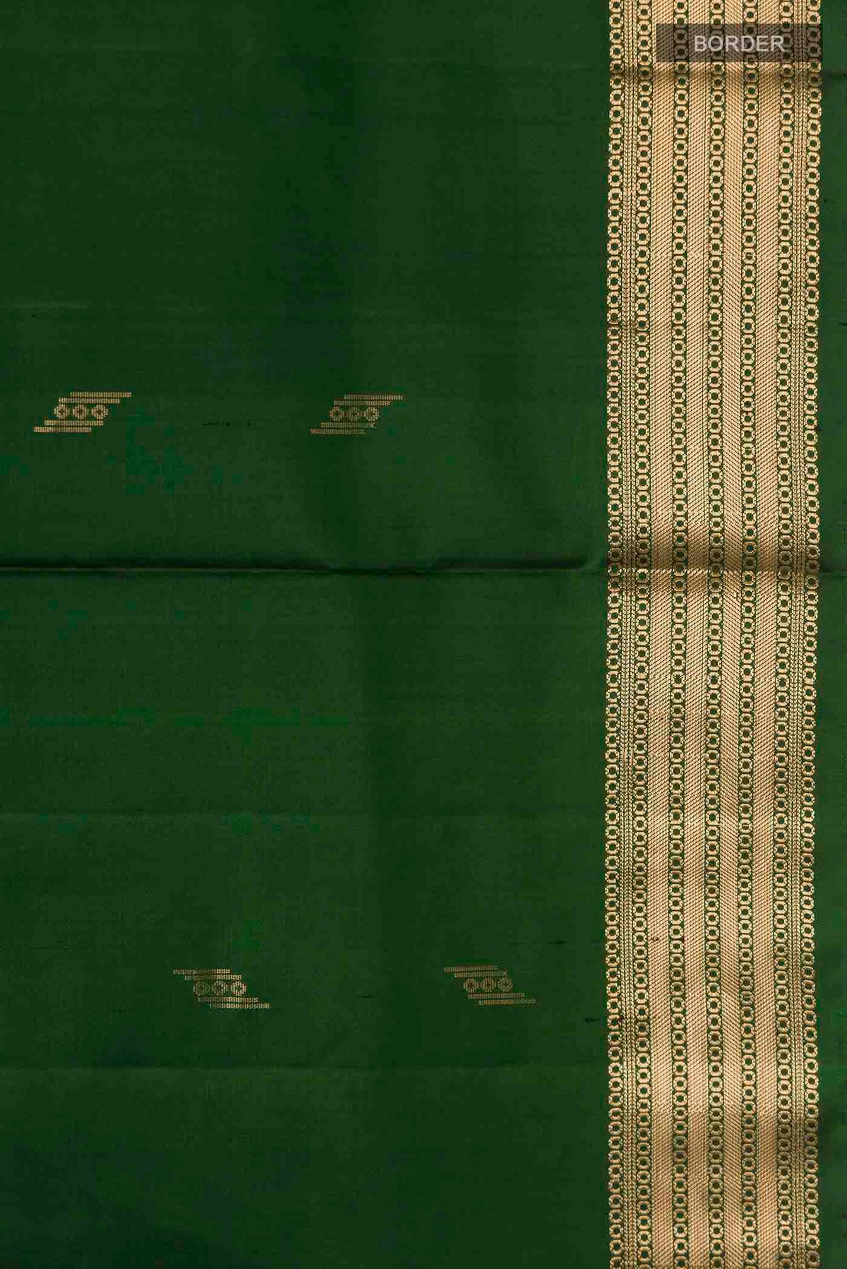 Border image of Green Soft Silk Saree with Zari Butta on the body and Zari Border