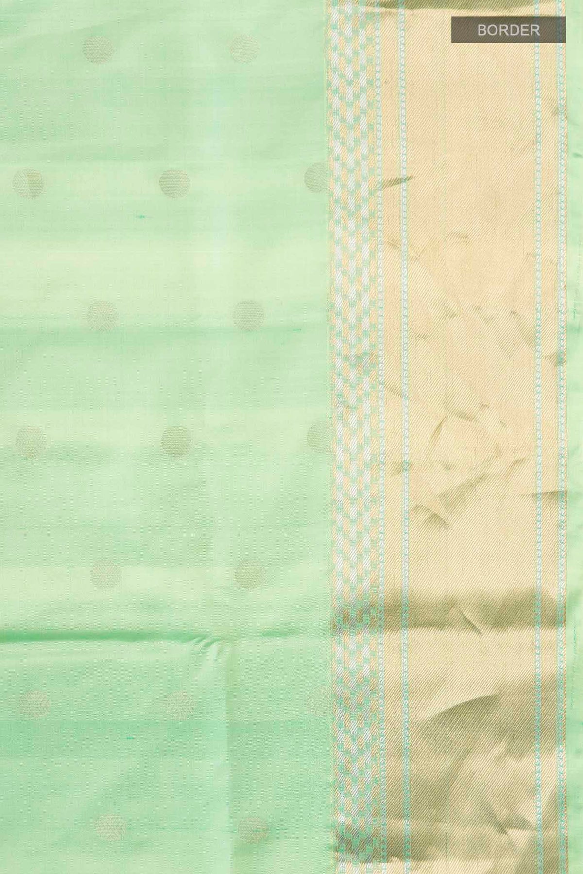 Border image of Green Soft Silk Saree with Zari Butta on the body and Zari Border