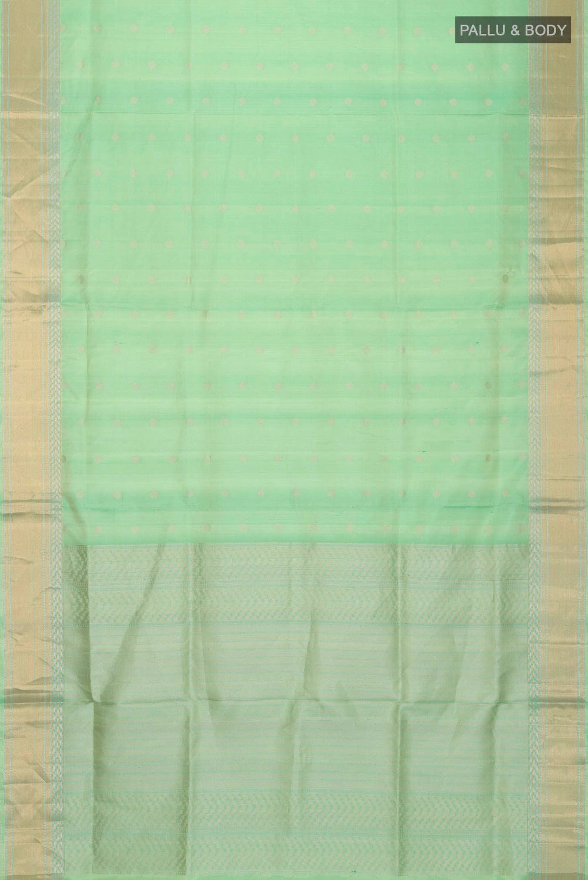 Flat view of Green Soft Silk Saree with Zari Butta on the body and Zari Border