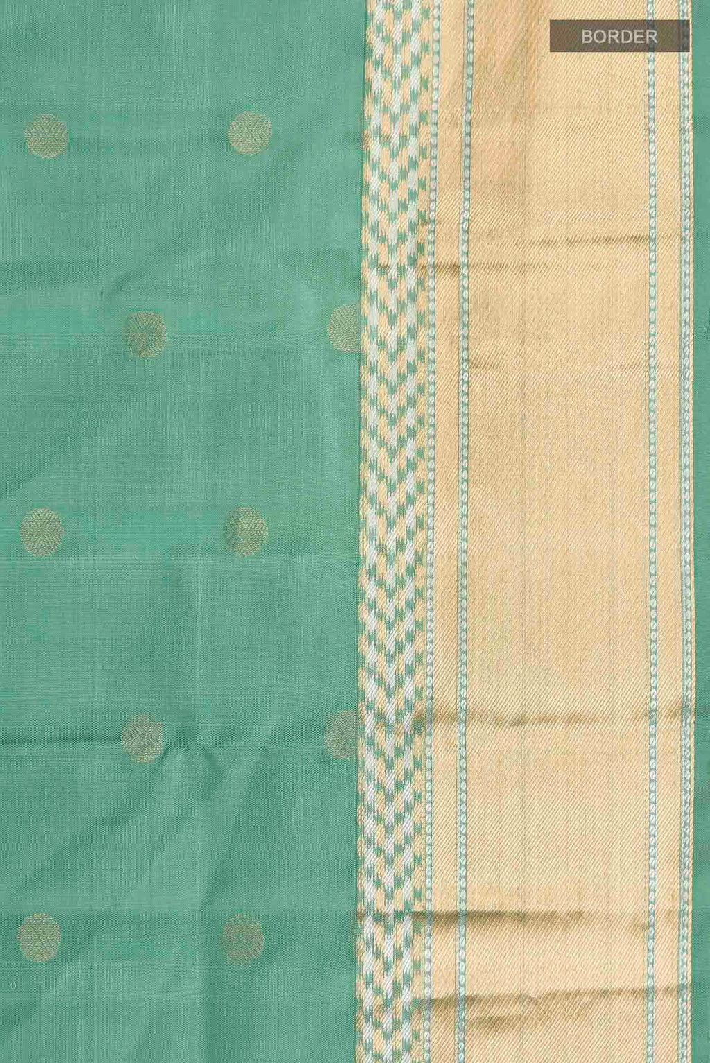 Border image of Green Soft Silk Saree with Zari Butta on the body and Zari Border