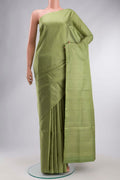 Green Soft Silk Saree with Zari Brocade on the body and Zari Border displayed on a mannequin