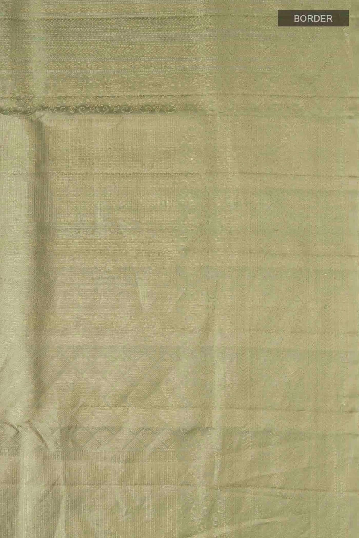 Border image of Green Soft Silk Saree with Zari Butta on the body and Zari Border