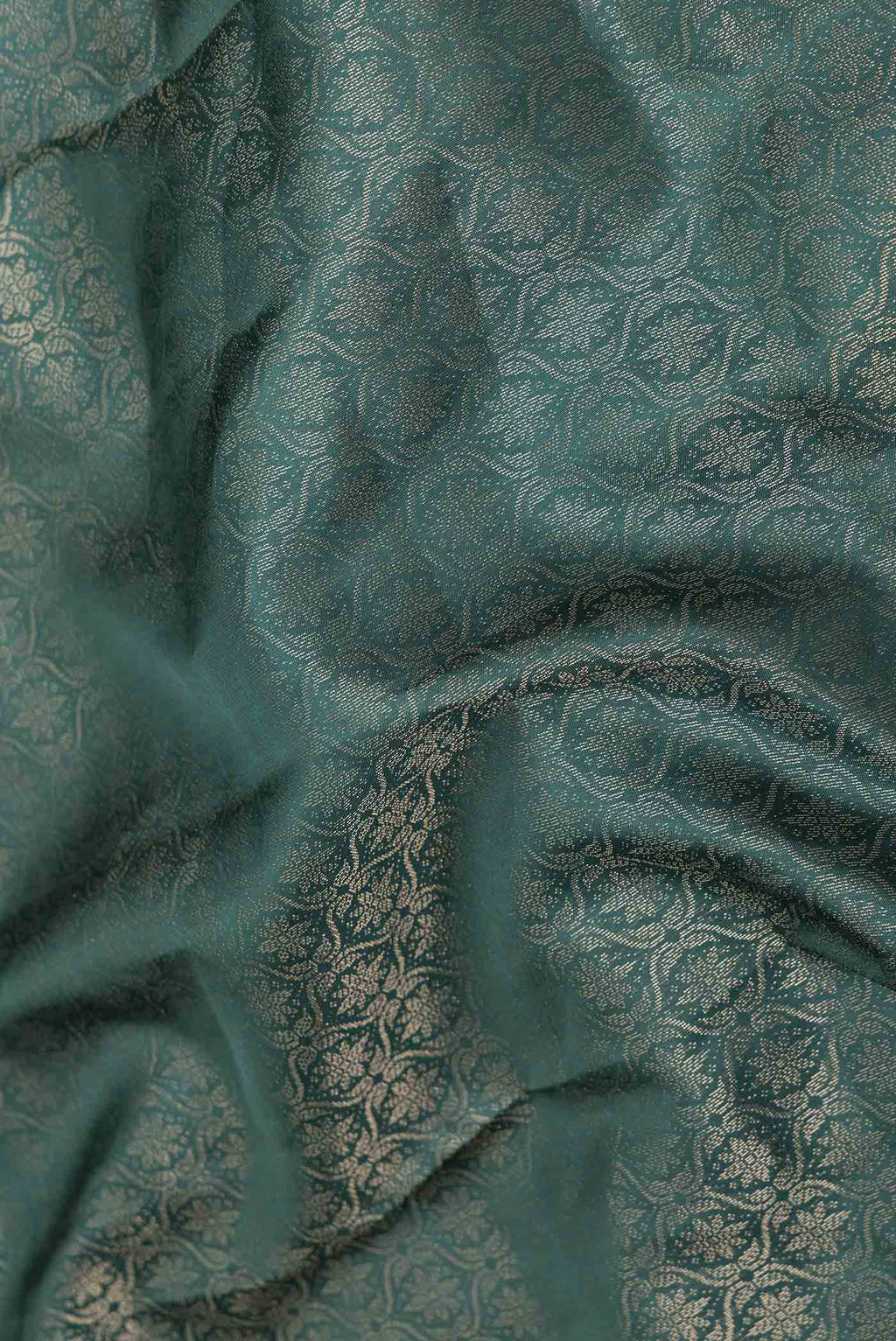Close up of Bottle Green Dual Tone Soft Silk Saree with Zari Brocade on the body and Zari Border displaying folds