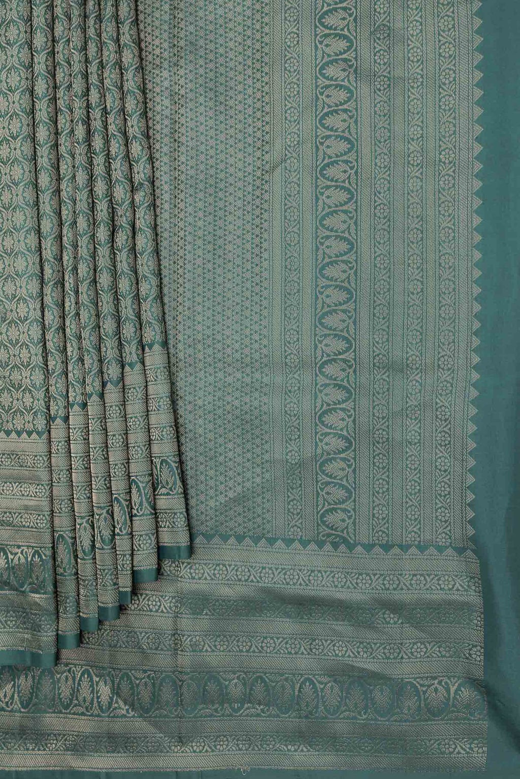 Pleats and pallu of Bottle Green Dual Tone Soft Silk Saree with Zari Brocade on the body and Zari Border
