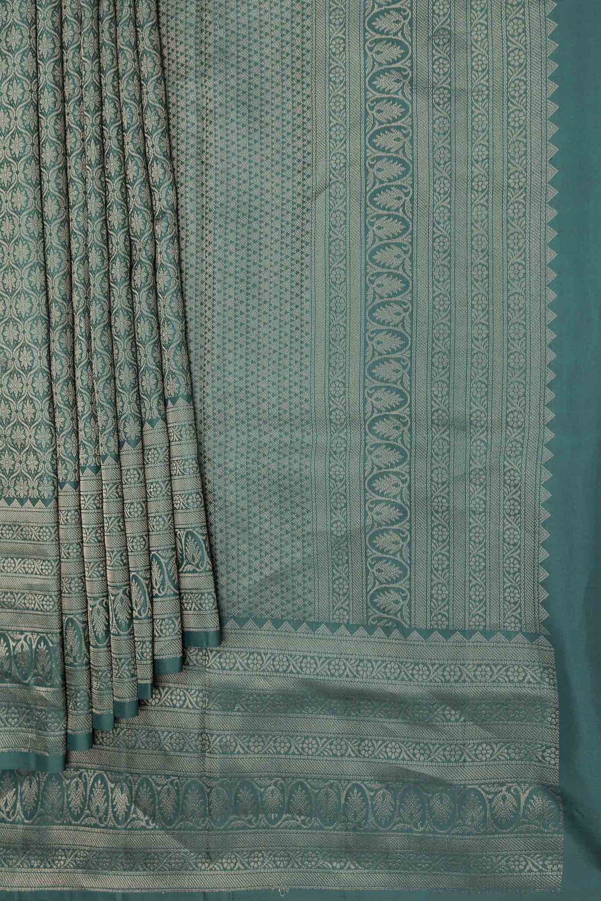 Pleats and pallu of Bottle Green Dual Tone Soft Silk Saree with Zari Brocade on the body and Zari Border