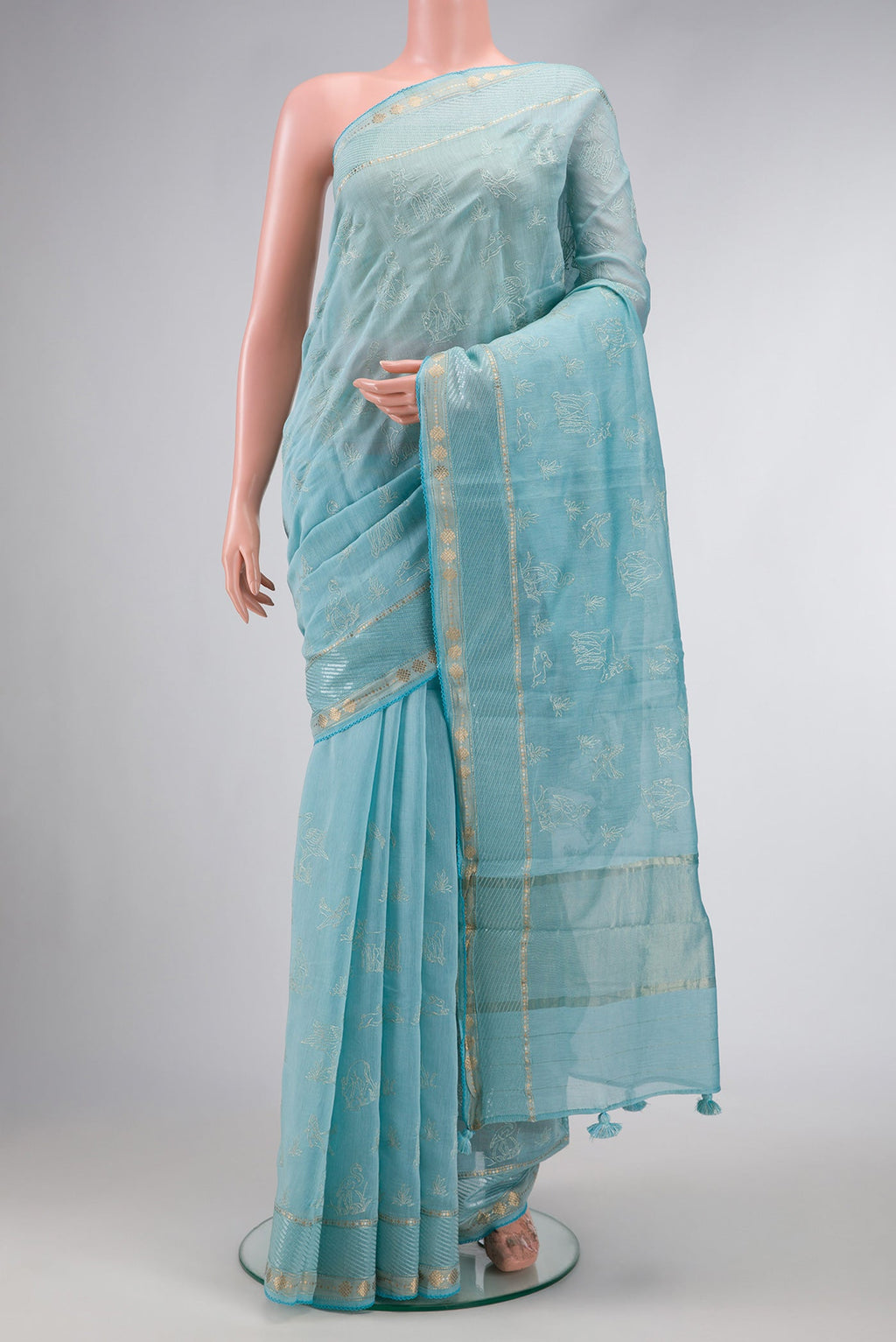 Sky Blue Dual Tone Chanderi Silk Saree with Zari Butta on the body and Zari Border.  displayed on a mannequin