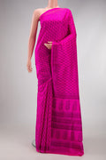 Dark Pink Dual Tone Printed Silk Saree with Printed design on the body and Printed Border.  displayed on a mannequin