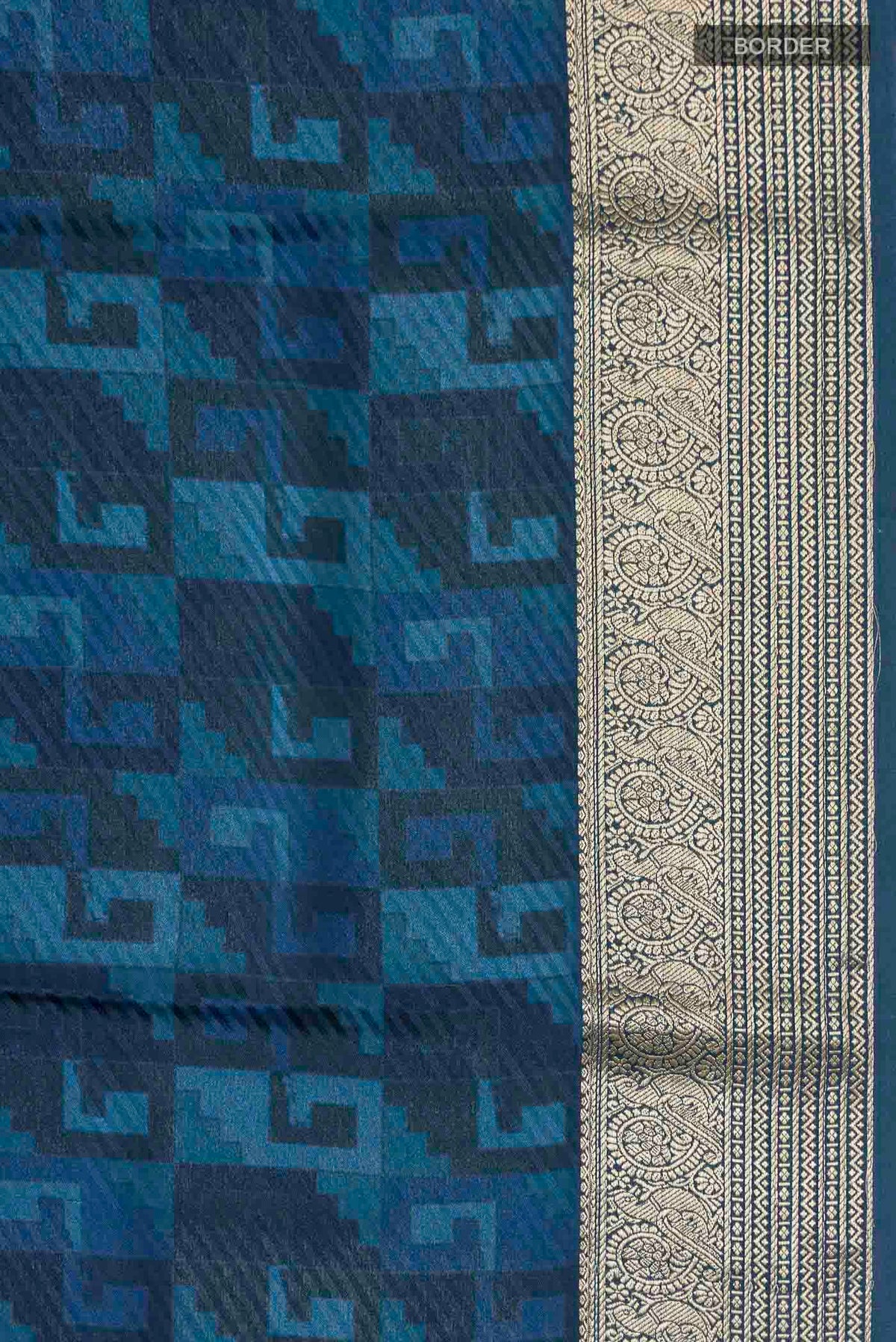Border image of Blue Mysore Crepe Saree with Printed design on the body and Zari Border