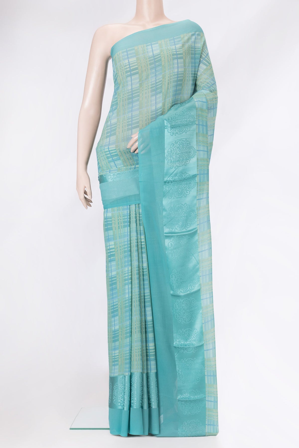 Mehandi Green Dual Tone Mysore Georgette Saree with Printed design on the body and Printed Border.  displayed on a mannequin