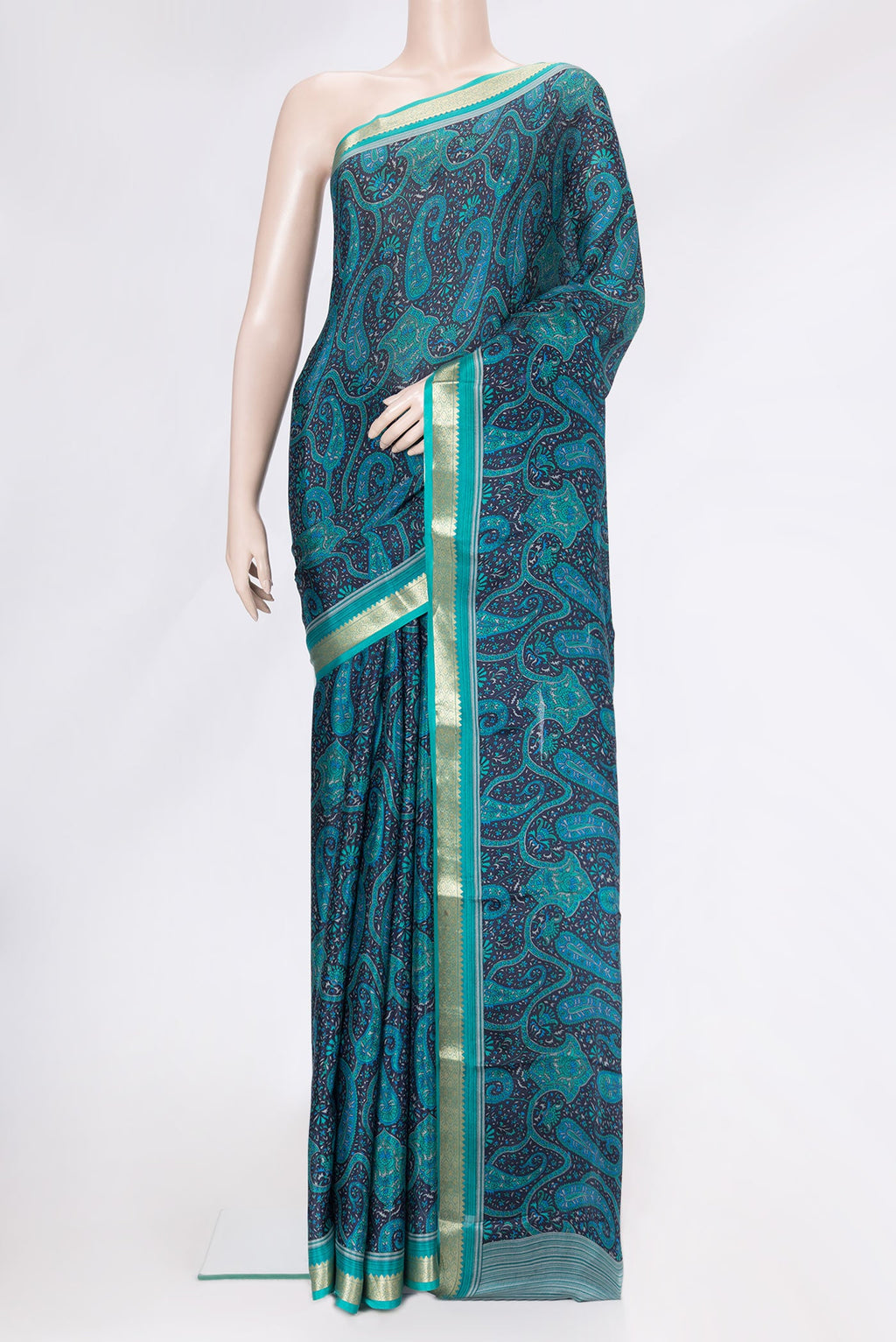 Navy Blue Dual Tone Crepe Saree with Printed design on the body and Zari Border.  displayed on a mannequin
