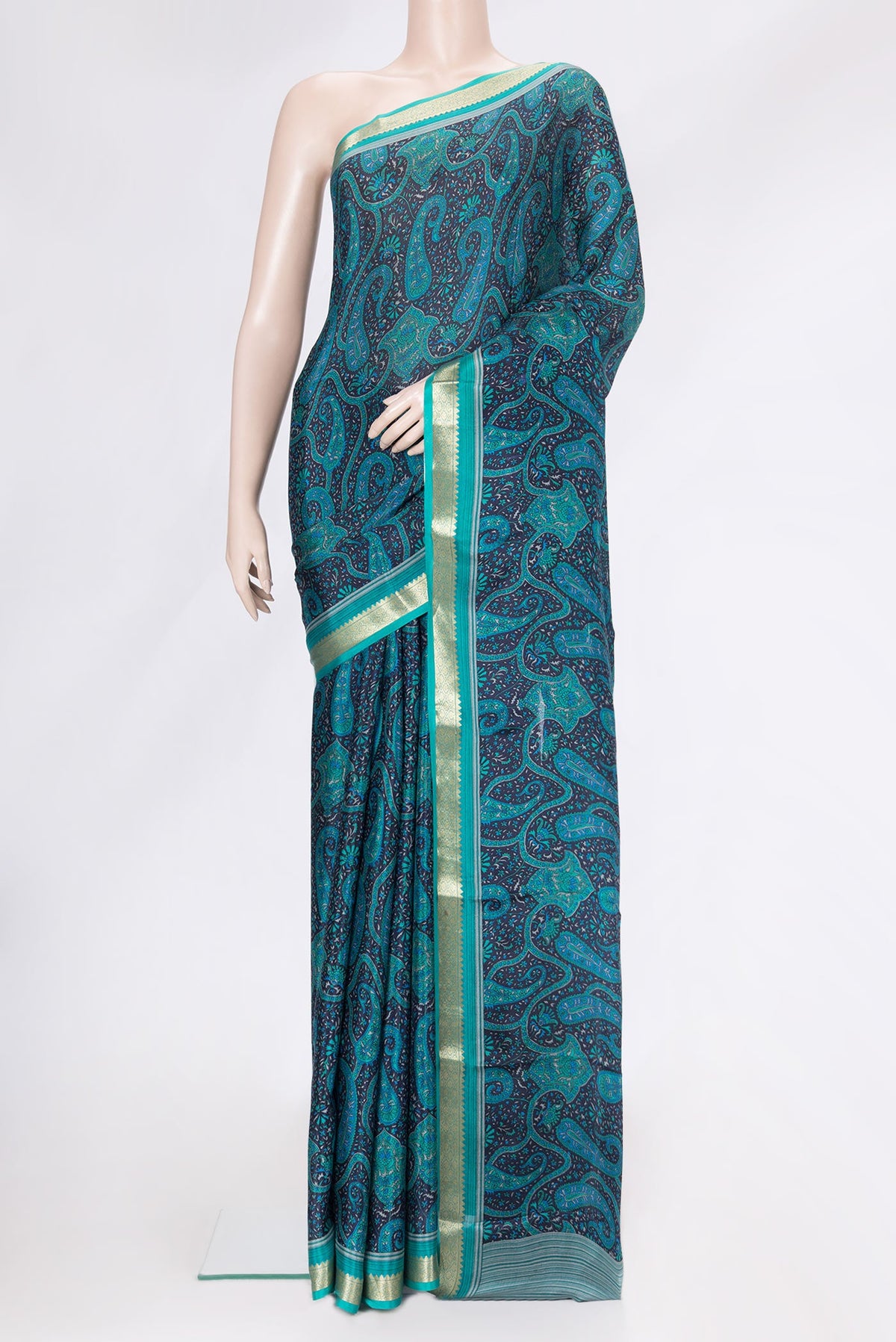 Navy Blue Dual Tone Crepe Saree with Printed design on the body and Zari Border.  displayed on a mannequin