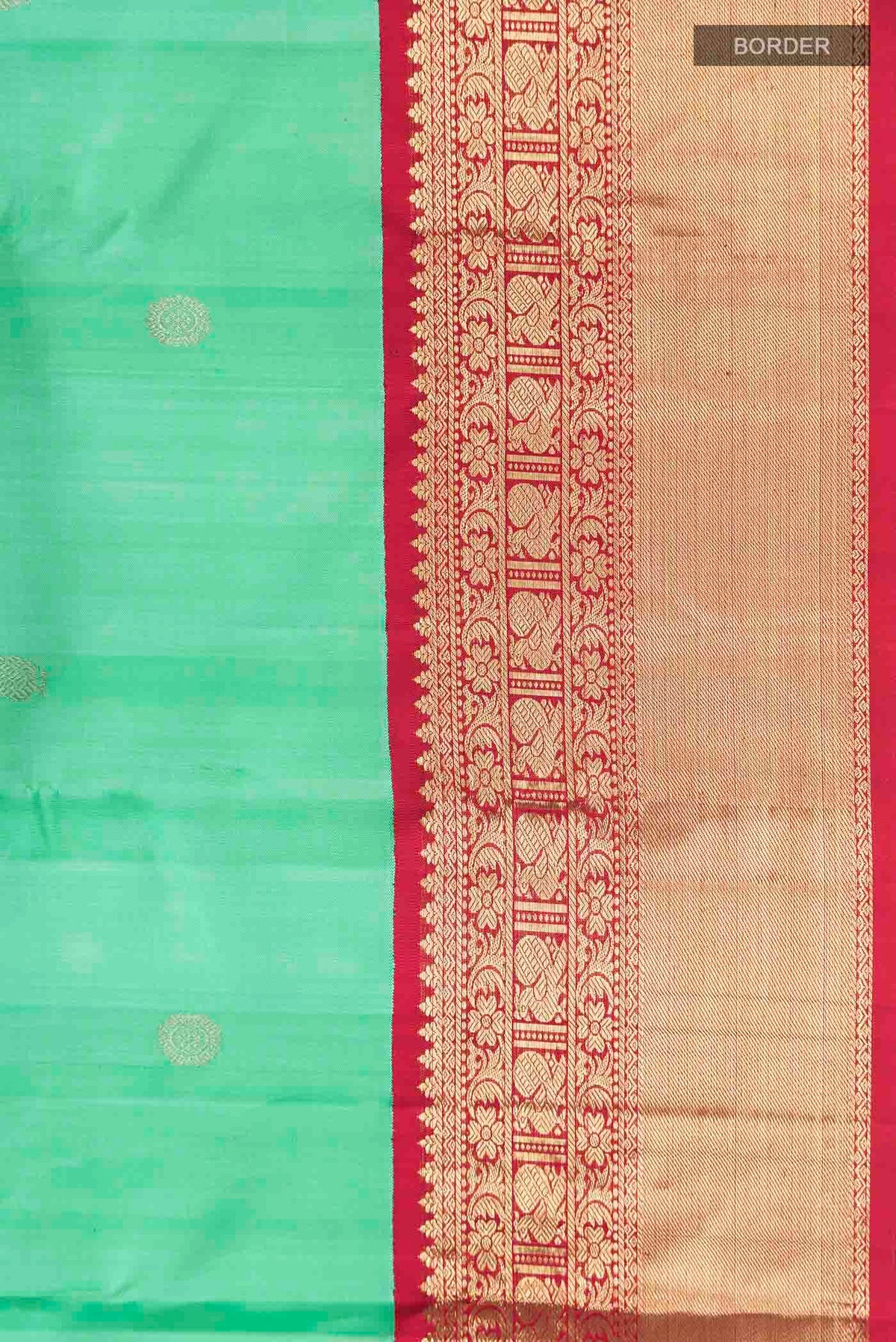 Border image of Green Kanchipuram Silk Saree with Zari Butta on the body and Zari Border