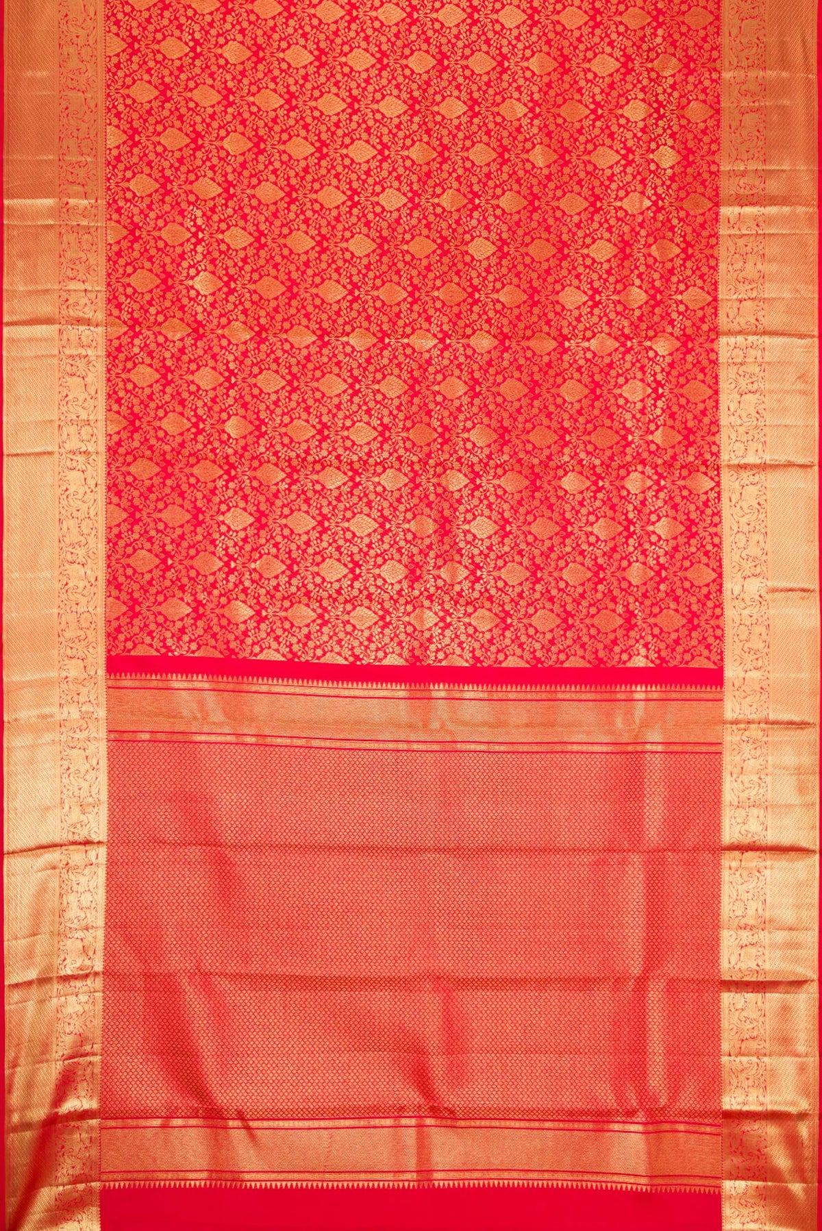 Flat view of Red Dual Tone Kanchipuram Silk Saree with Zari Brocade on the body and Zari Border. 