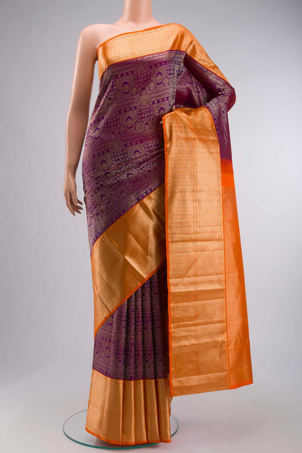 Violet Kanchipuram Silk Saree with Zari Brocade on the body and Zari Border displayed on a mannequin