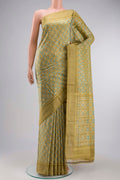 Green Pochampally Silk Saree with Pure Ikat on the body and Zari Border displayed on a mannequin