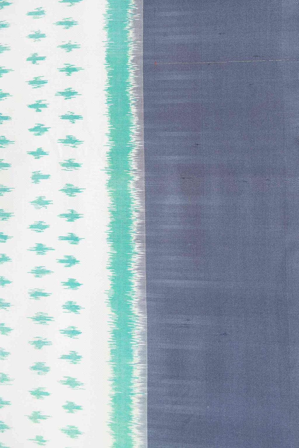 Border image of Off White Dual Tone Double Ikat Saree with Ikat Print on the body and Zari Border