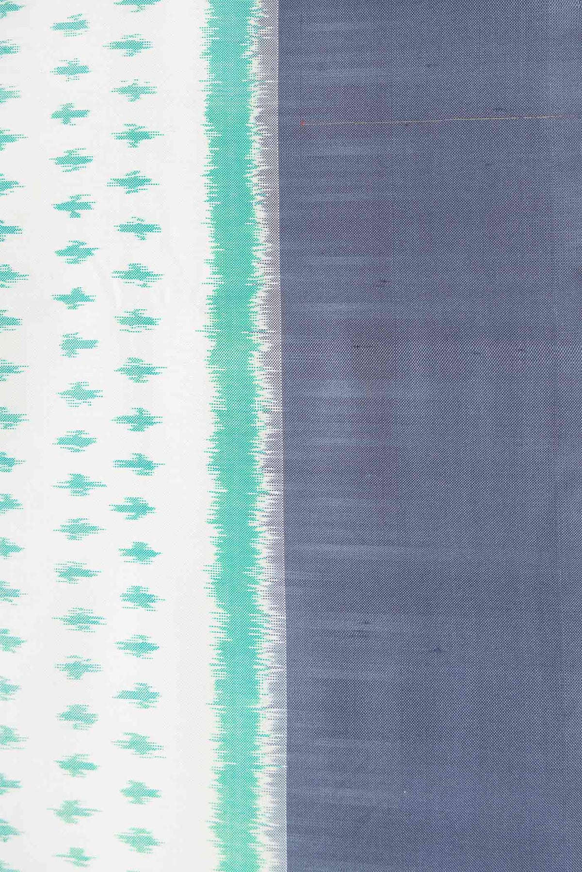 Border image of Off White Dual Tone Double Ikat Saree with Ikat Print on the body and Zari Border