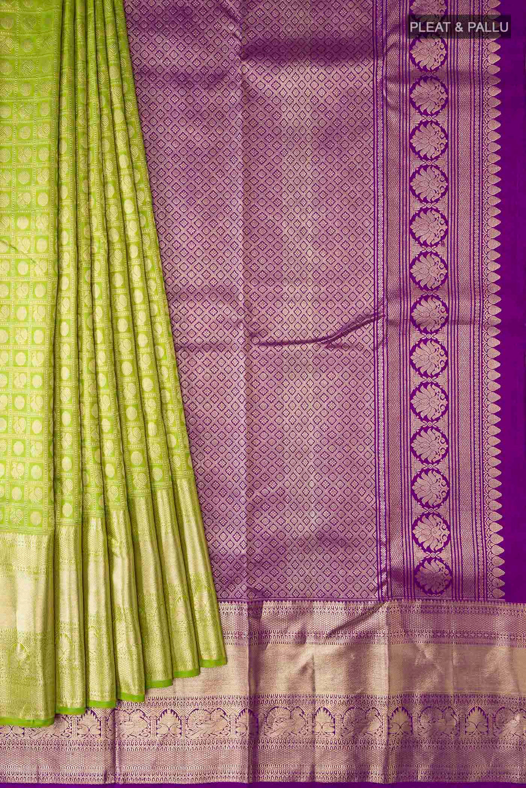 Pleats and pallu of Green Kanchipuram Silk Saree with Zari Brocade on the body and Zari Border