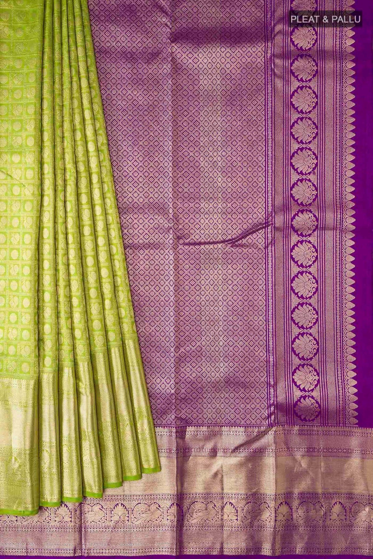 Pleats and pallu of Green Kanchipuram Silk Saree with Zari Brocade on the body and Zari Border