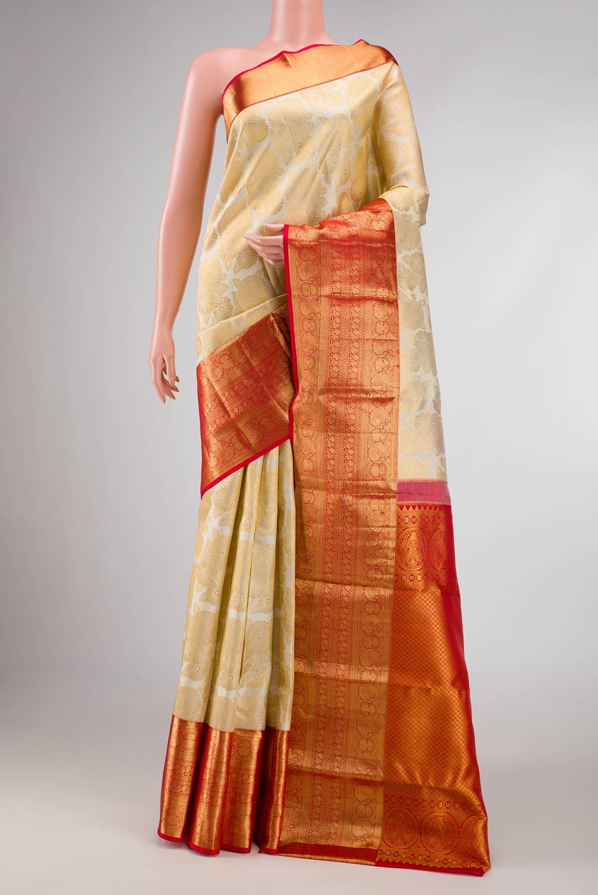 Off White Dual Tone Kanchipuram Silk Saree with Zari Brocade on the body and Zari Border displayed on a mannequin