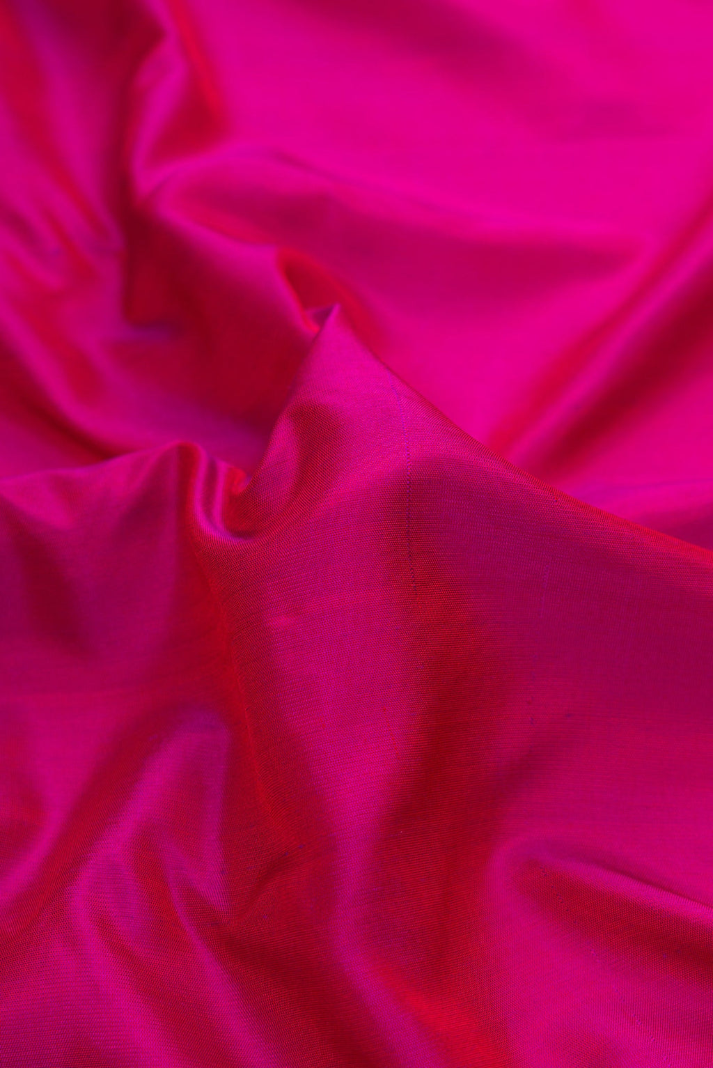 Close up of Pink Dual Tone Gadwal Silk Saree with Plain Body and Zari Border.  displaying folds