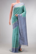 Light Blue Dual Tone Gadwal Silk Saree with Checked design on the body and Plain Border.  displayed on a mannequin