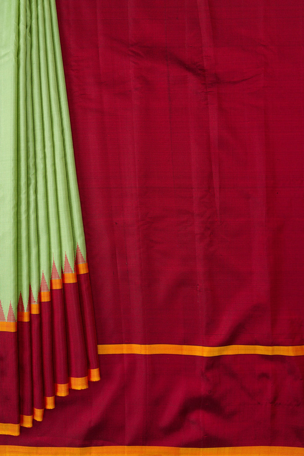 Pleats and pallu of Pista Green Dual Tone Gadwal Silk Saree with Plain Body and Temple Border. 