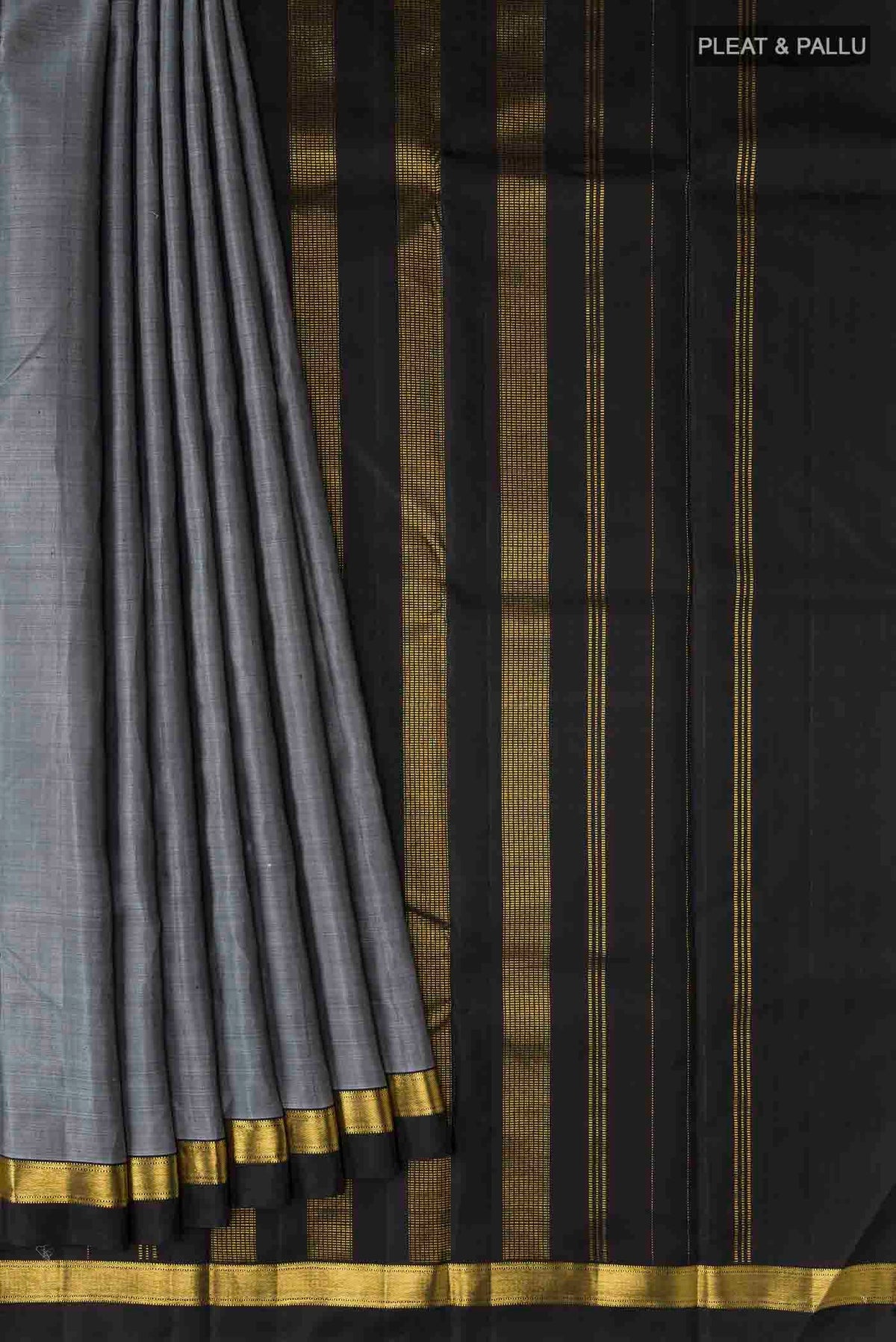 Pleats and pallu of Grey Kanchipuram Silk Saree with Plain Body and Zari Border