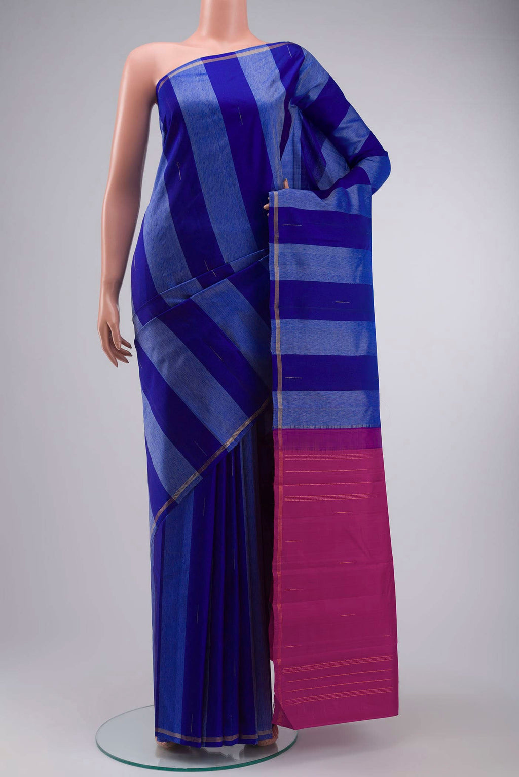 Blue Kanchipuram Silk Saree with Stripes on the body and Zari Border displayed on a mannequin