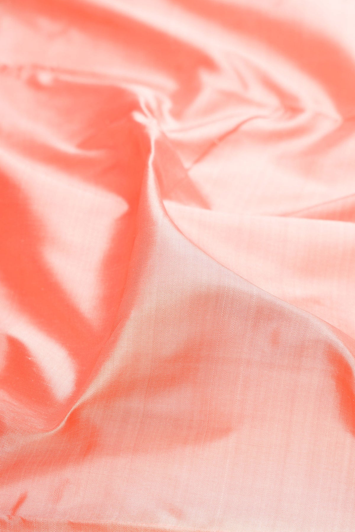 Close up of Pure Silk Pure Zari Golden Peach Kanchipuram Nine Yards Saree with Plain Body and Zari Border.  displaying folds