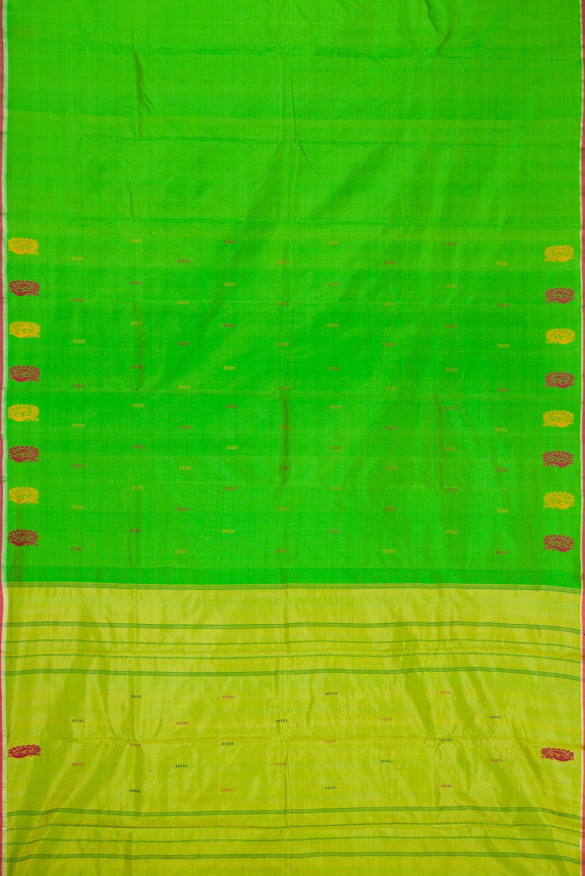 Green Dual Tone Kanchipuram Silk Saree with Thread Butta on the body and Thread Border.  displayed on a mannequin