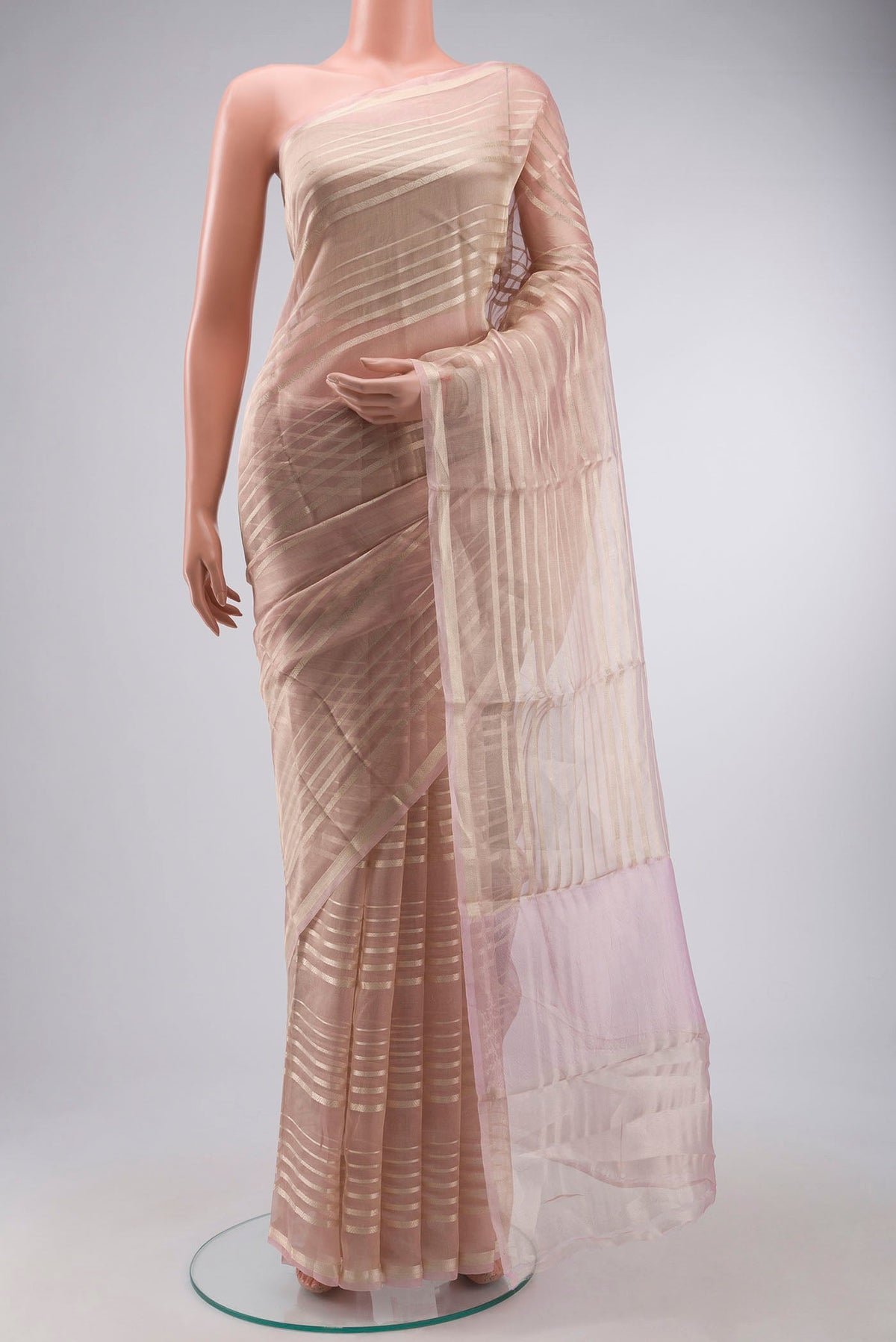 Pink Tissue Silk Saree with Stripes on the body and Zari Border displayed on a mannequin