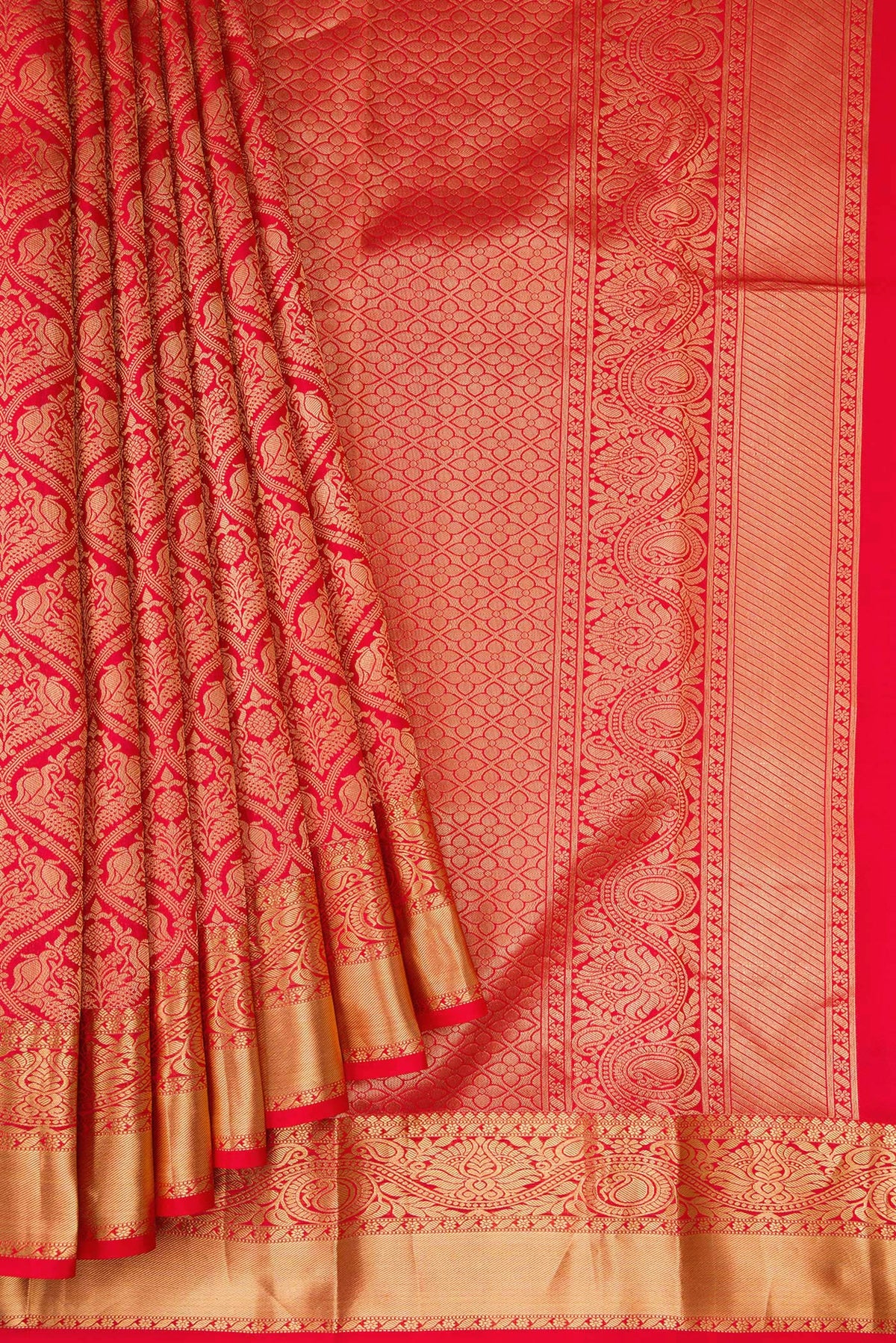 Pleats and pallu of Red Kanchipuram Silk Saree with Zari Brocade on the body and Zari Border. 