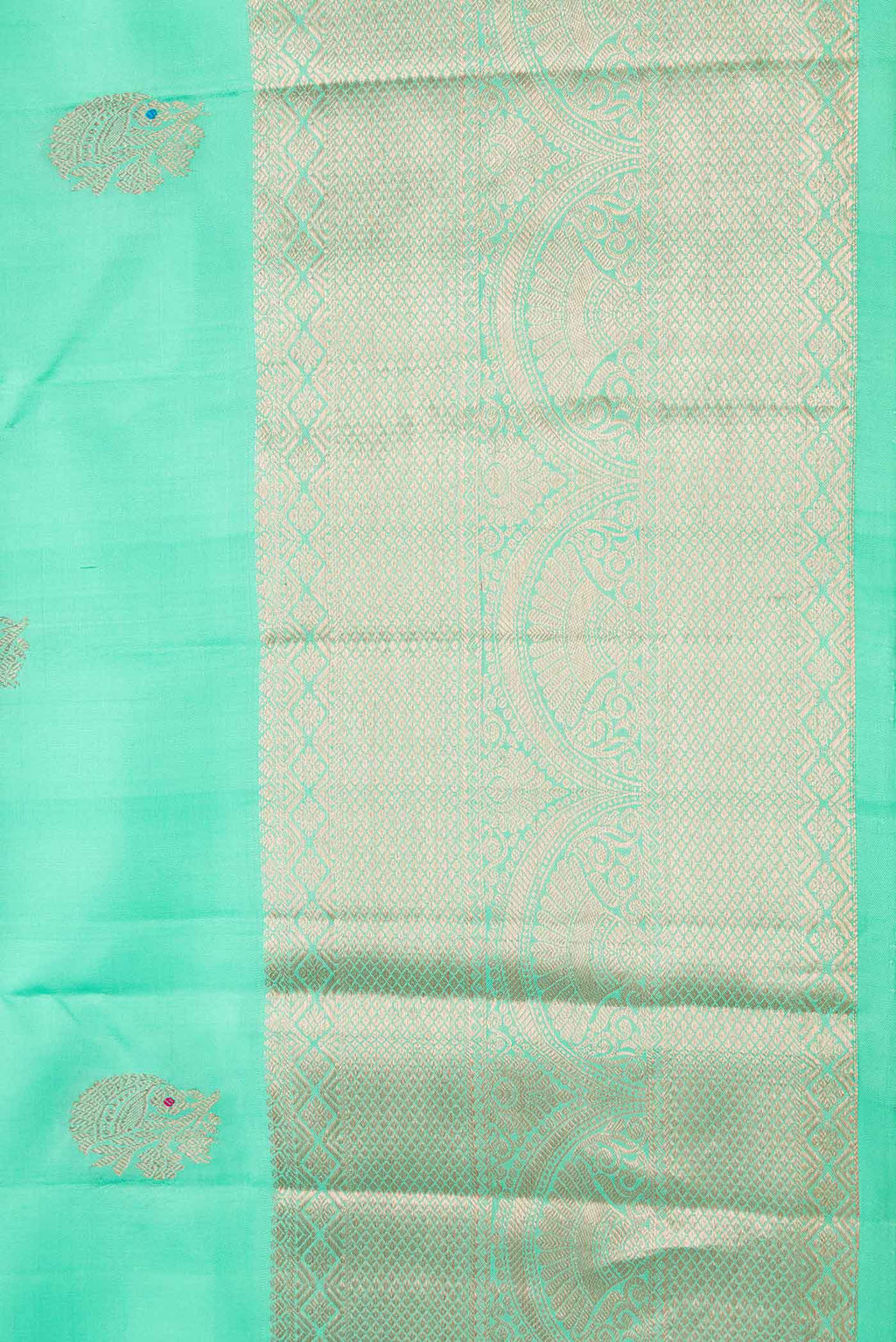 Border image of Light Green Dual Tone Kanchipuram Silk Saree with Zari Butta on the body and Zari Border