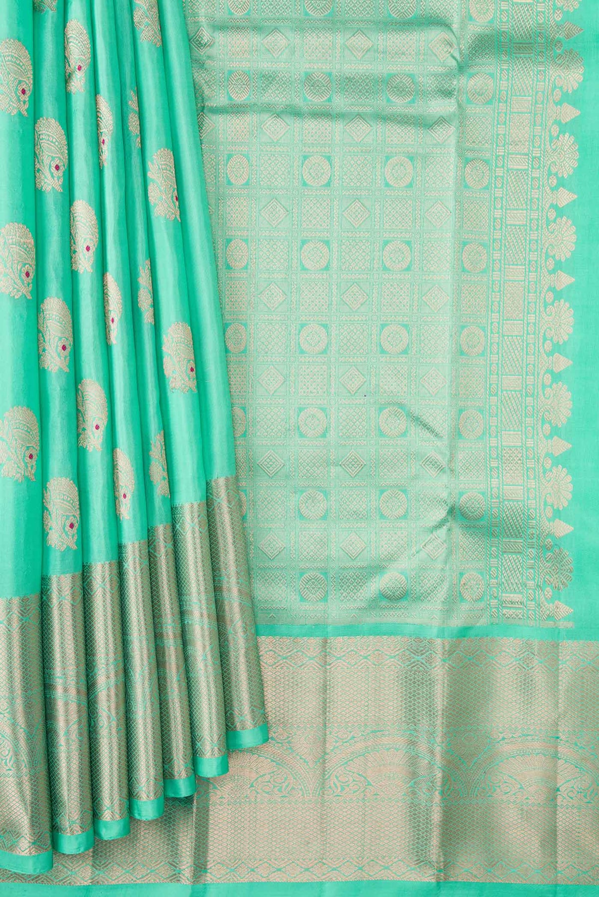 Pleats and pallu of Light Green Dual Tone Kanchipuram Silk Saree with Zari Butta on the body and Zari Border