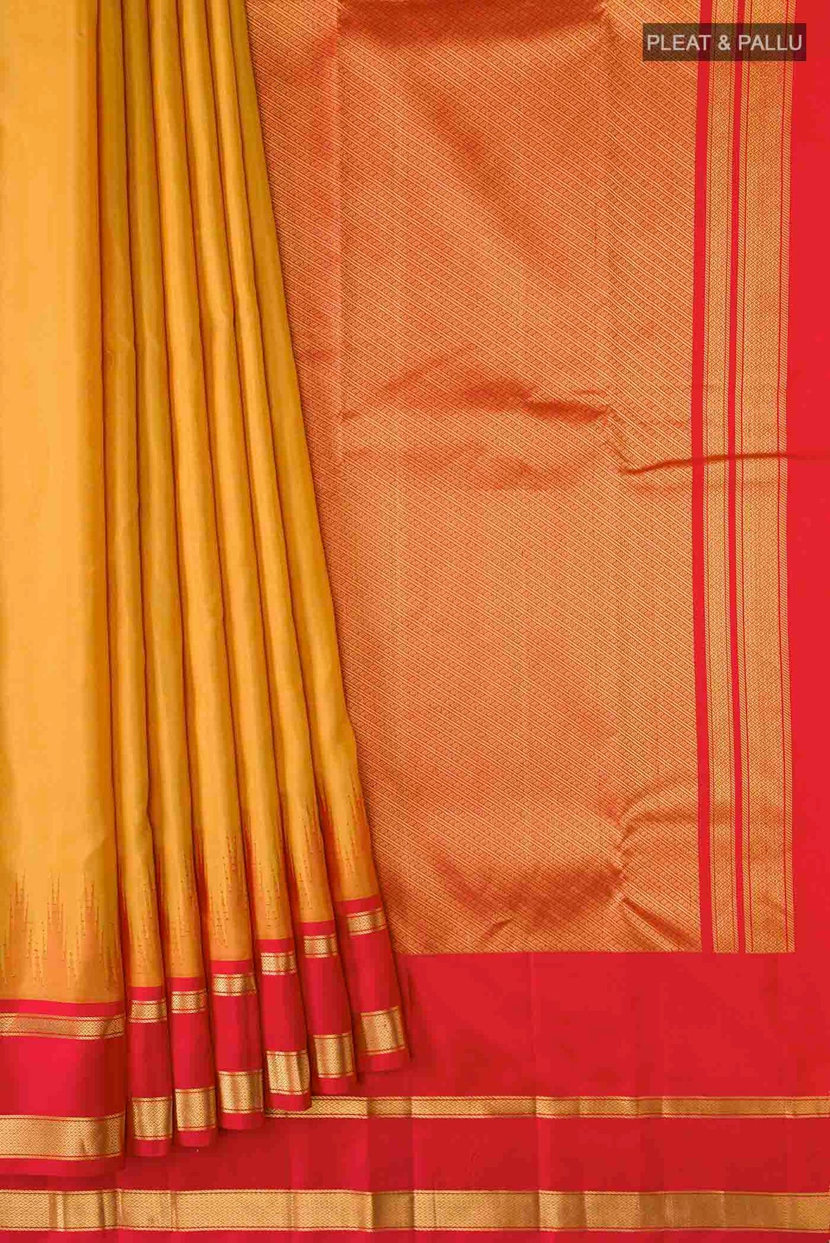 Pleats and pallu of Yellow Kanchipuram Silk Saree with Plain Body and Zari Border