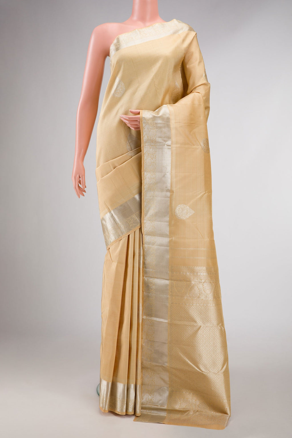 Sandal Dual Tone Kanchipuram Silk Saree with Zari Butta on the body and Zari Border displayed on a mannequin