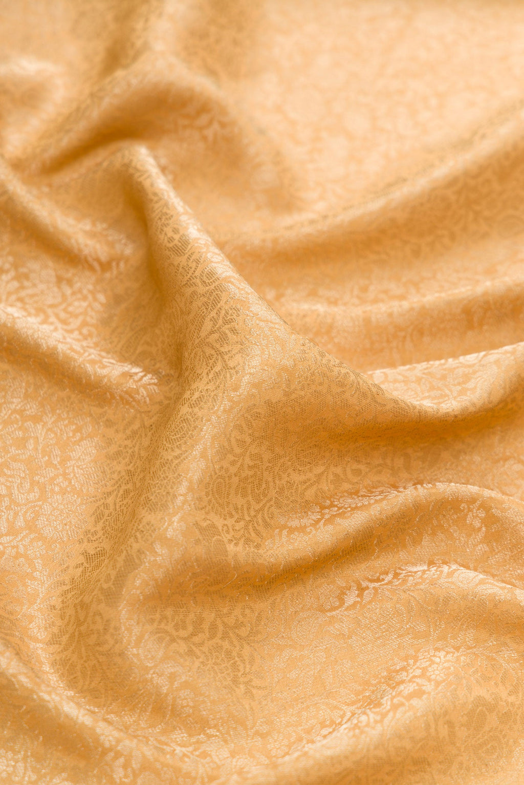 Close up of Sandal Dual Tone Mysore Silk Saree with Zari Brocade on the body and Zari Border.  displaying folds