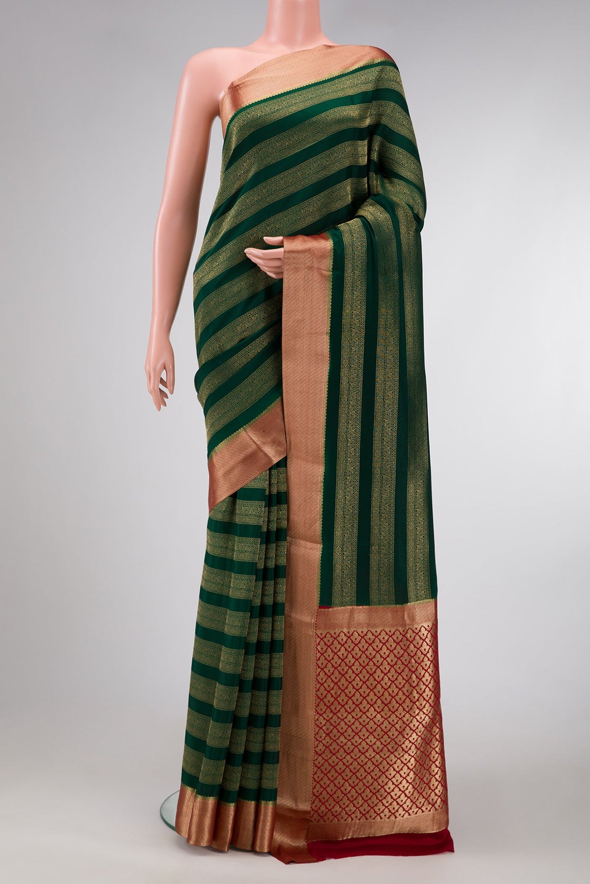 Bottle Green Dual Tone Mysore Silk Saree with Stripes on the body and Zari Border.  displayed on a mannequin