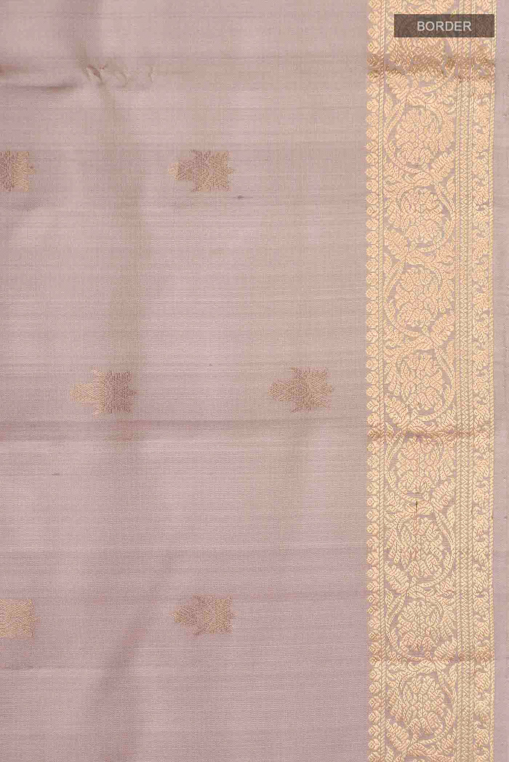 Border image of Grey Soft Silk Saree with Zari Butta on the body and Zari Border