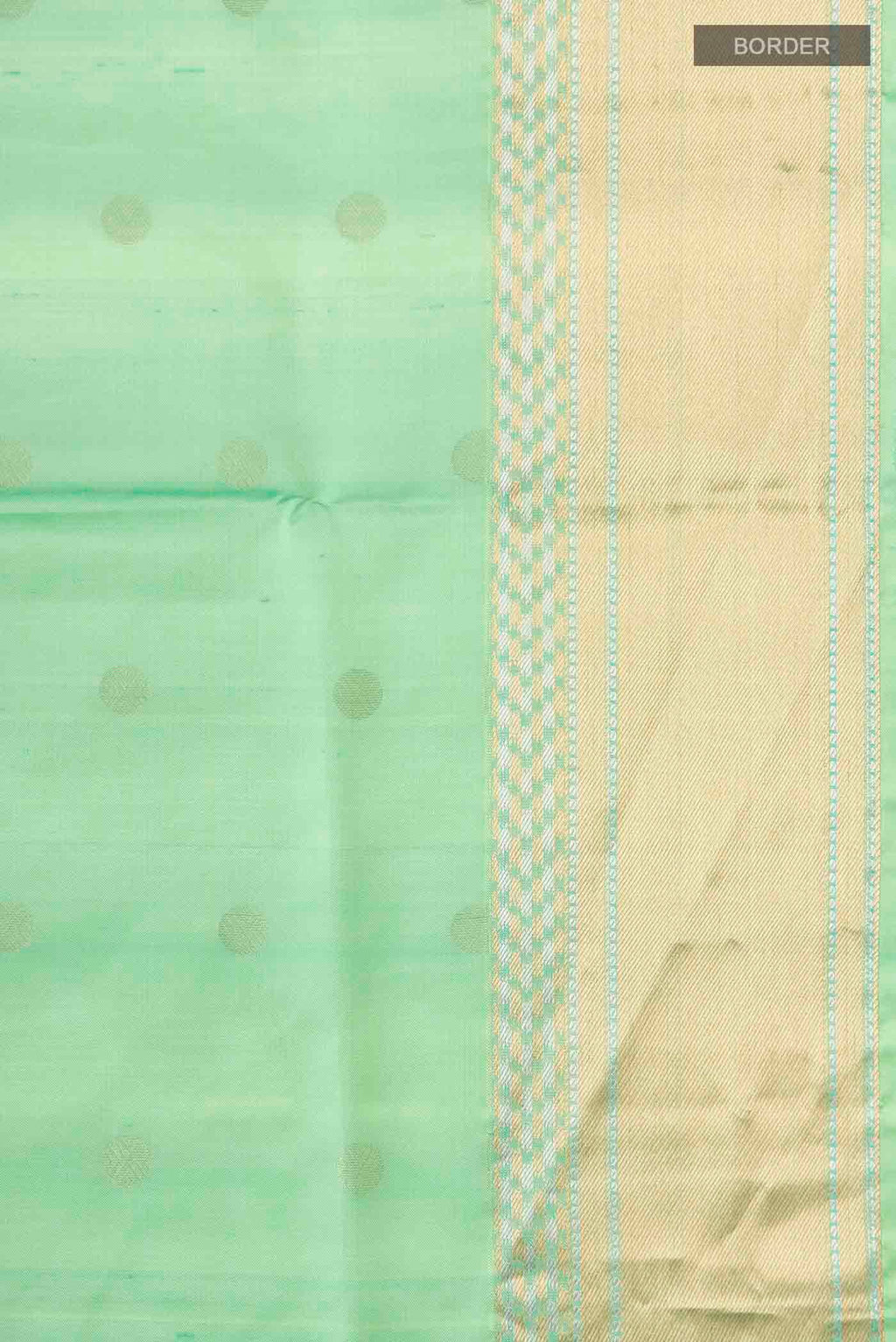 Border image of Green Soft Silk Saree with Zari Butta on the body and Zari Border