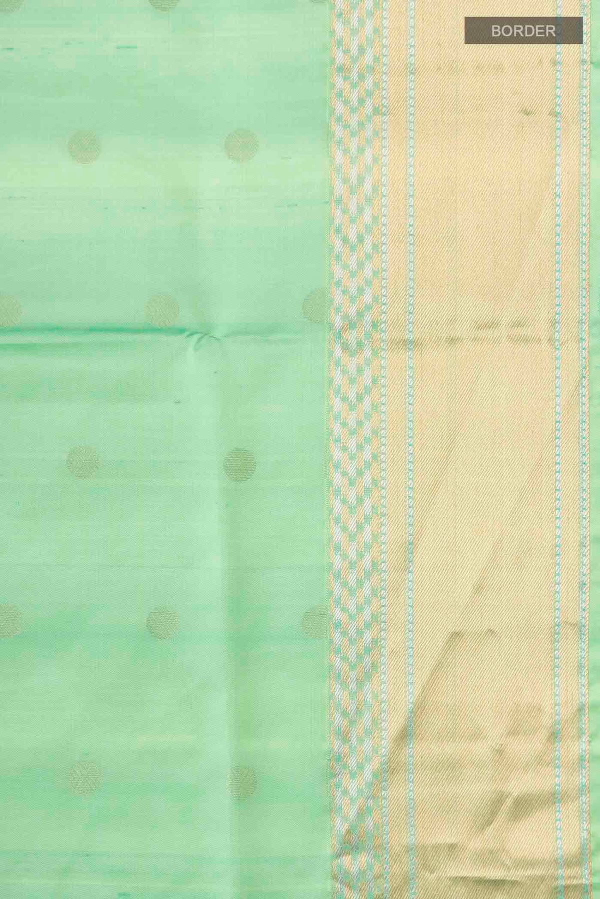 Border image of Green Soft Silk Saree with Zari Butta on the body and Zari Border