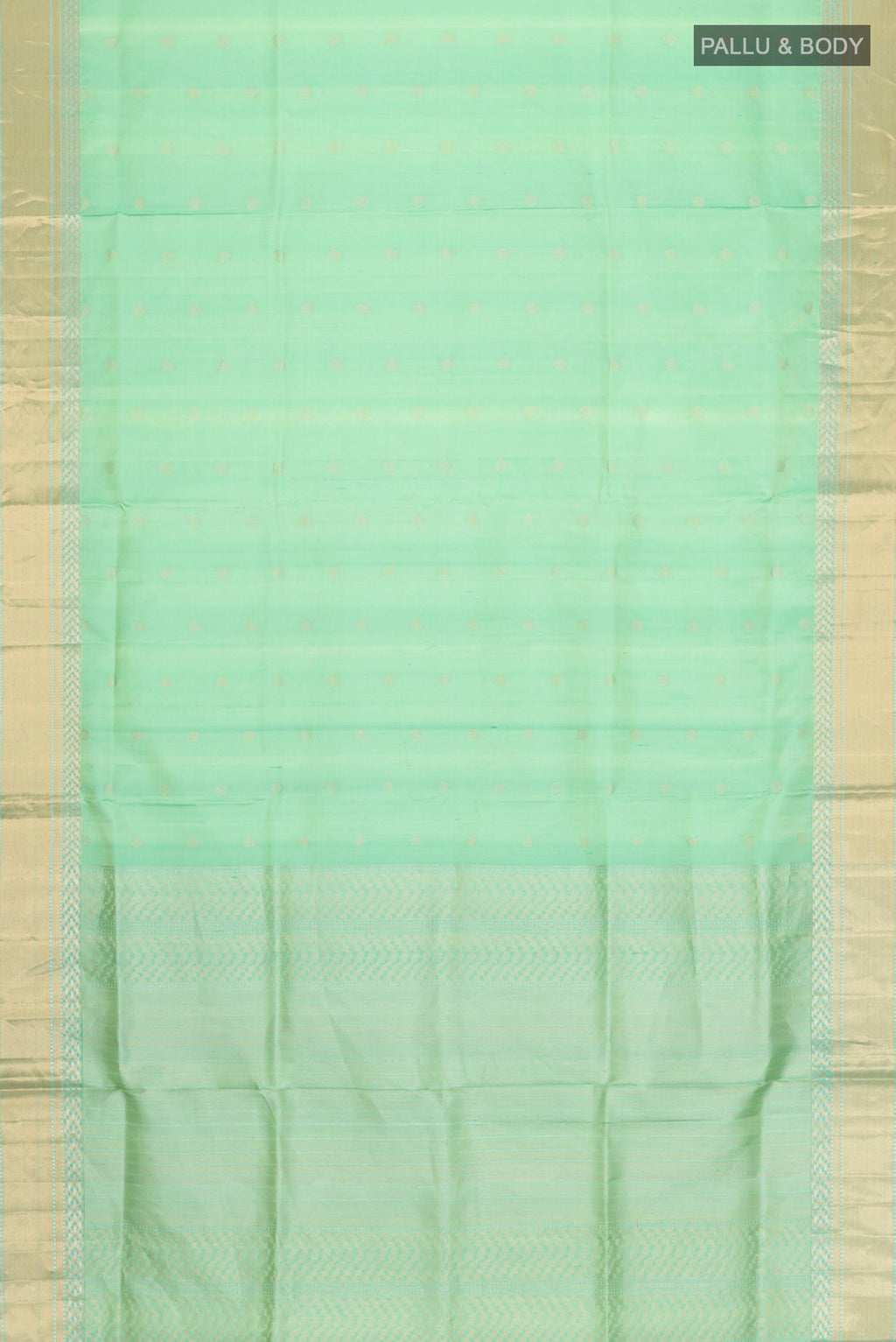 Flat view of Green Soft Silk Saree with Zari Butta on the body and Zari Border