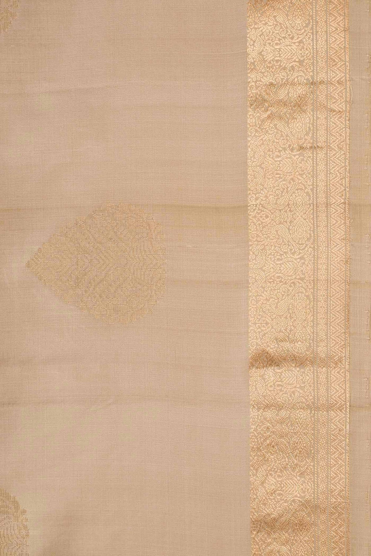 Border image of Beige Dual Tone Soft Silk Saree with Zari Butta on the body and Zari Border