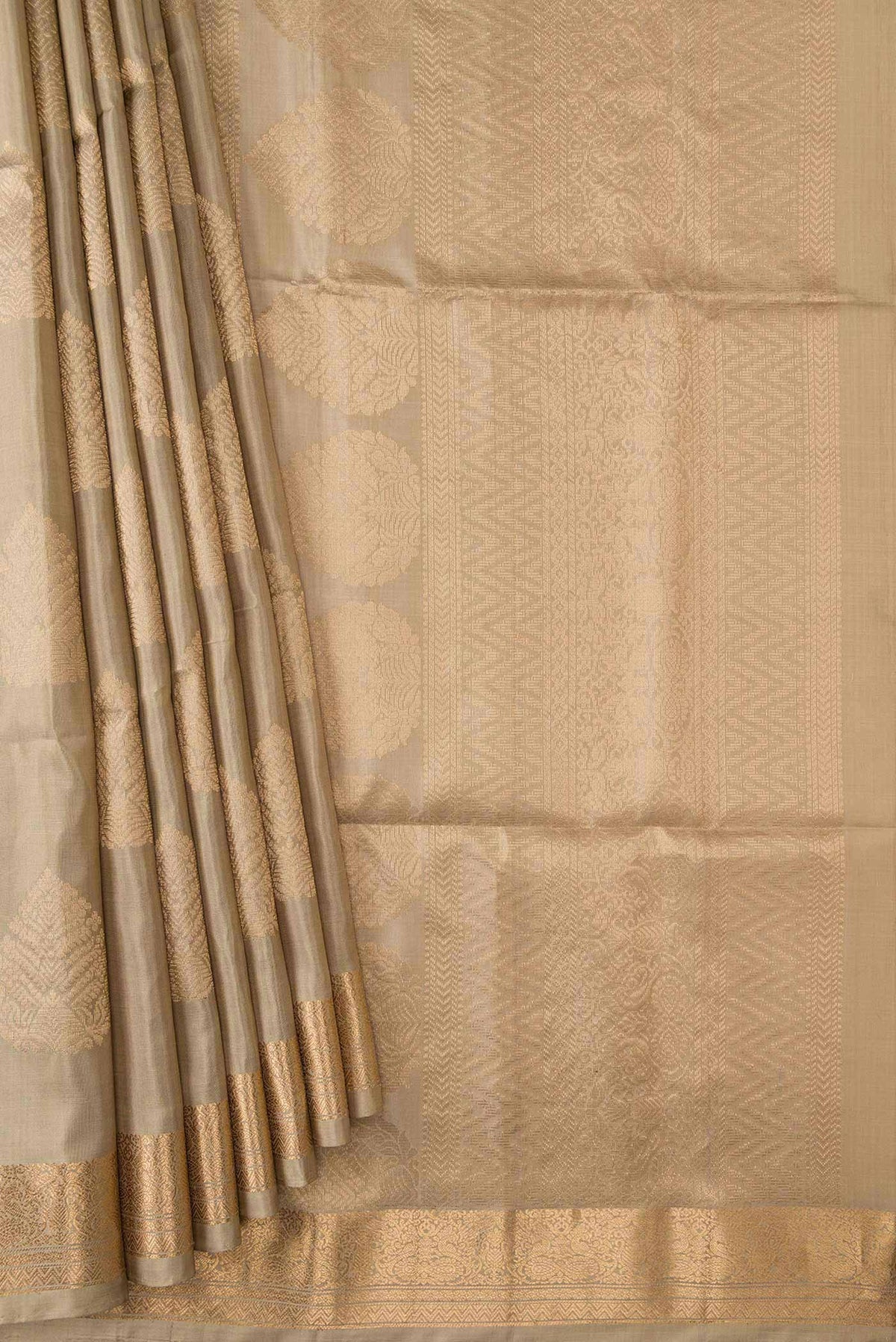 Pleats and pallu of Beige Dual Tone Soft Silk Saree with Zari Butta on the body and Zari Border