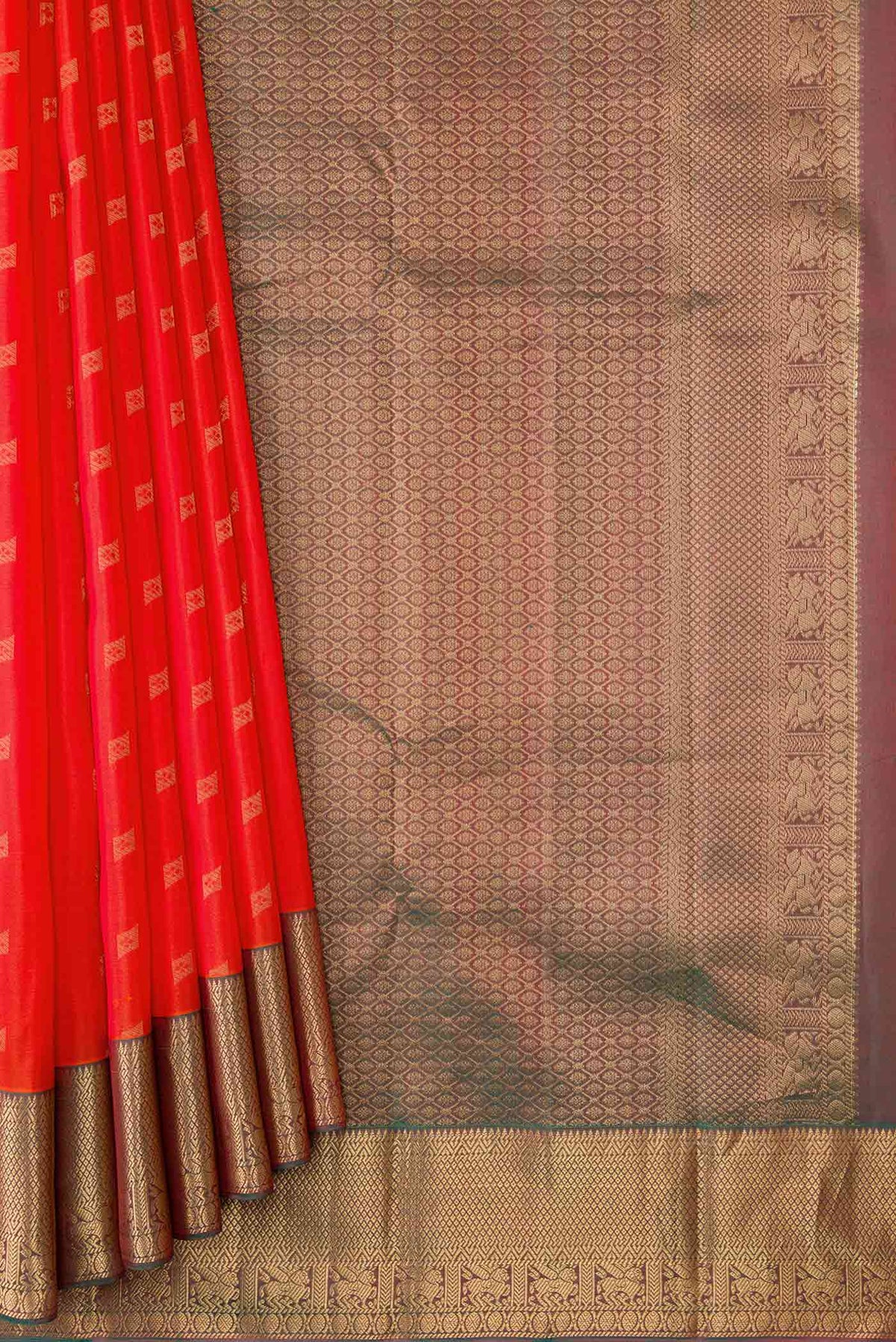 Pleats and pallu of Orange Dual Tone Kanchipuram Silk Saree with Zari Butta on the body and Zari Border